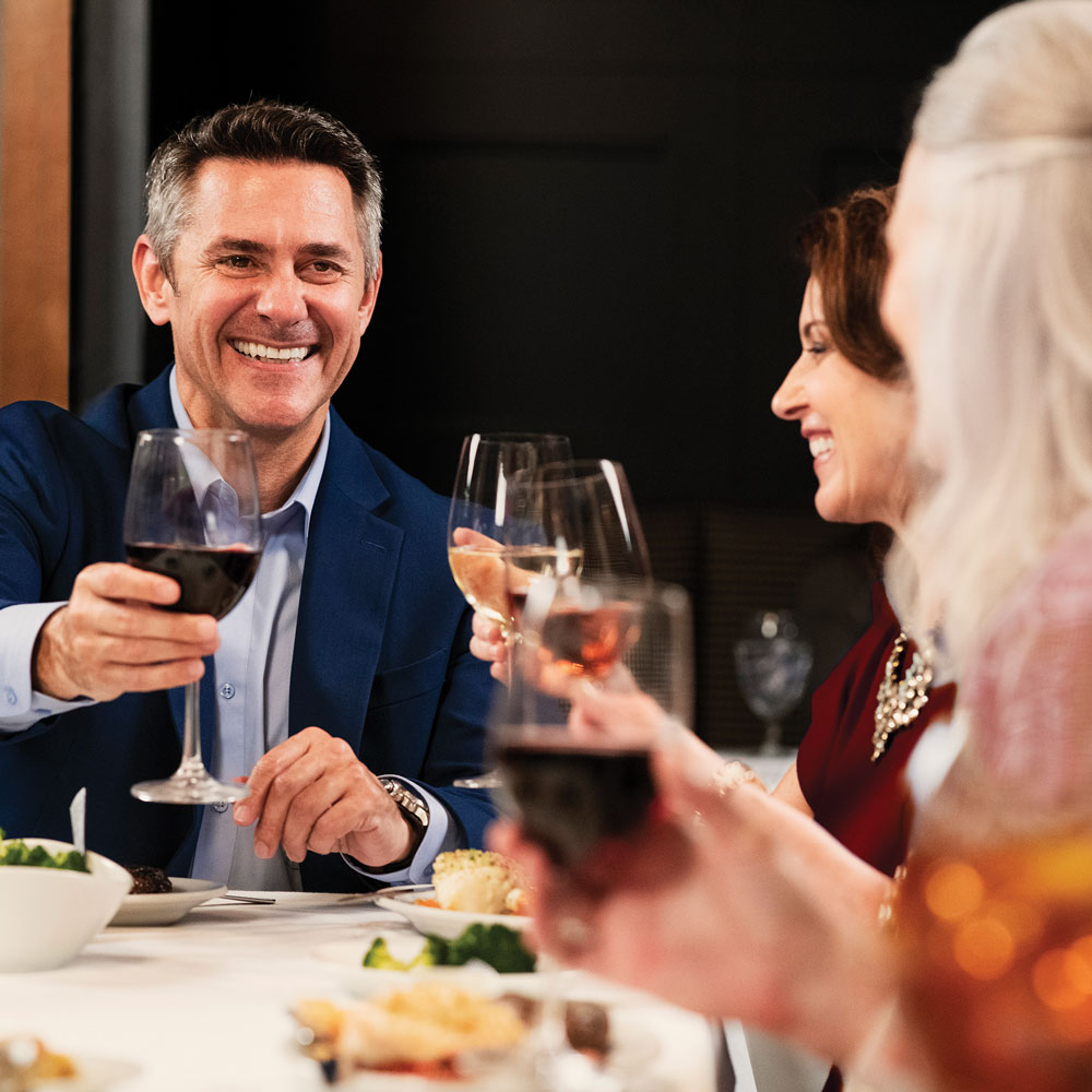 Family enjoys a toast at Ruth's Chris