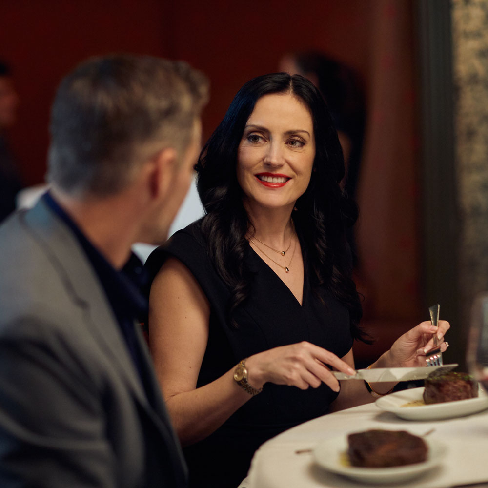 Couple shares conversation over steak at Ruth's Chris